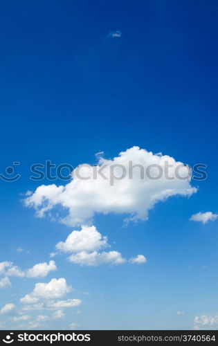 white fluffy clouds in the blue sky