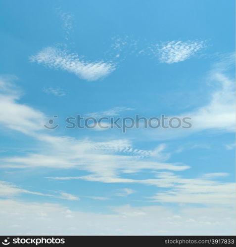 white fluffy clouds in the blue sky