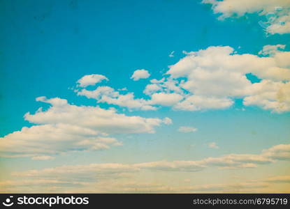 white fluffy clouds in the blue sky