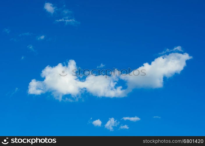 white fluffy clouds in the blue sky