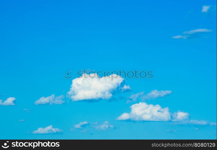 white fluffy clouds in the blue sky