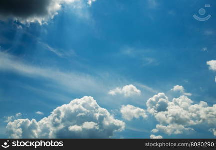 white fluffy clouds in the blue sky