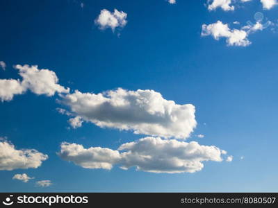 white fluffy clouds in the blue sky