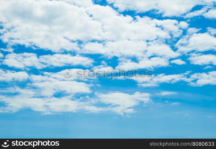 white fluffy clouds in the blue sky