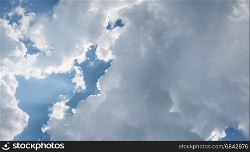 White fluffy clouds. White fluffy clouds on a blue sky background