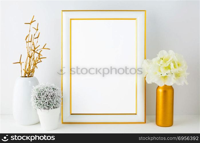 White frame mockup with small cactus. White frame mockup with small cactus. Frame mockup. Poster Mockup. Styled mockup. Product mockup. Design Mockup. White frame mockup. Gold frame mockup.