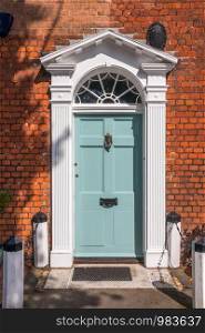White front door of Georgian style house in Beaconsfield, Buckinghamshire, England