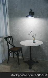 white garnite table with chair and vase