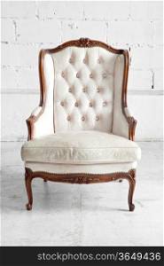 White genuine leather classical style sofa in vintage room