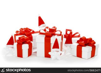 White gift box with red ribbon bow isolated on white background close-up