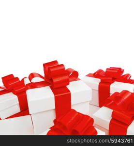 White gift boxes with red ribbon bows isolated on white background close-up