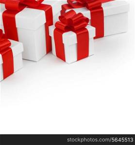 White gift boxes with red ribbons