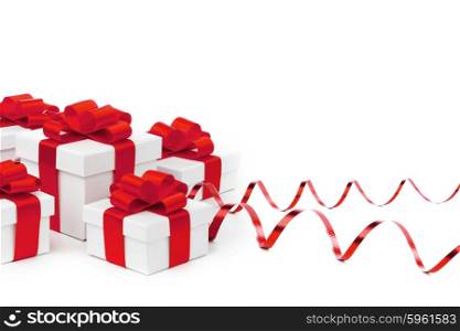 White gift boxes with red ribbons isolated on white background