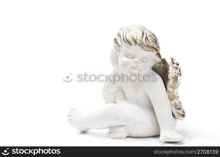 white golden thinking christmas angel figurine. white golden thinking christmas angel figurine on white background