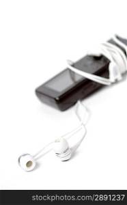 White headphones with black player