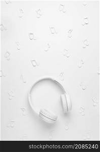white headphones with musical notes