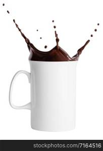 White high cup with a splash of hot chocolate isolated on a white background. White high cup with splash of hot chocolate