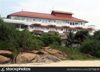 White hotel on the Bentota bach in Sri Lanka