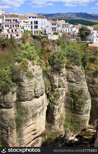 White houses of Ronda town on a high cliff in Andalusia region of Spain, Malaga province.