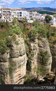 White houses of Ronda town on a high cliff in Andalusia region of Spain, Malaga province.