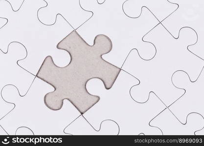 white jigsaw puzzle as a background close up blank empty