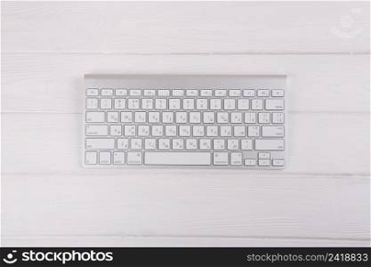 white keyboard wooden table