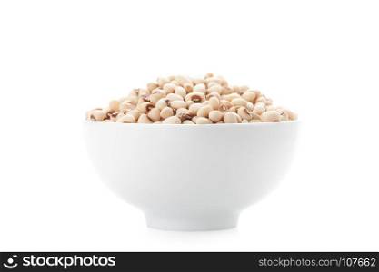 white kidney bean in white cearamic bowl isolated on white background with clipping path