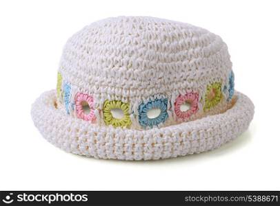 White knitted childrens summer cap on white background