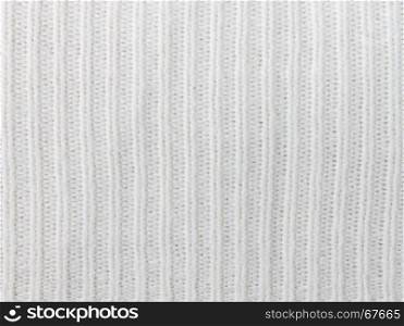White knitting or knitted fabric texture pattern background. Knitting or knitted. White knitting background. knitting texture, knitting pattern.