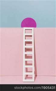 white ladder with pink circle. Beautiful photo. white ladder with pink circle