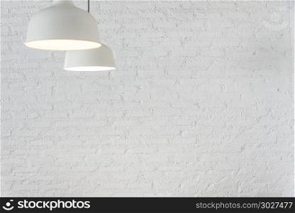 White lamps with blurred white brick wall background. Electronic. White lamps with blurred white brick wall background. Electronic and lighting background concept. Vintage backdrop. Picture for add text message. Backdrop for design art work.