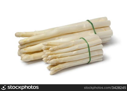 White large and mini asparagus on white background