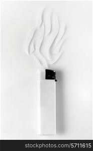 white lighter and abstract smoke on white background