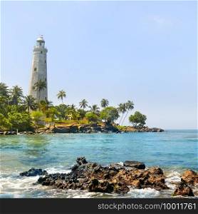 White lighthouse Dondra Head and tropical palms, Sri Lanka, near Matara
