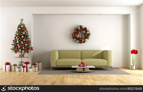 white living room with christmas tree. White living room with christmas tree and green sofa - 3d rendering