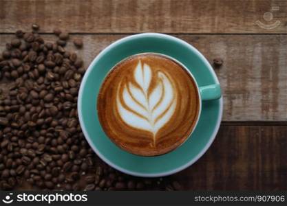 white,milk,aroma,background,beverage,black,book,breakfast,brown,cafe,caffeine,cappuccino,closeup,coffee,cup,dark,drink,energy,espresso,foam,food,fresh,hot,latte,morning,mug,old,space,still,style,table,texture,vintage,wood,wooden