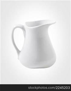 White milk pitcher isolated on white background. White milk pitcher