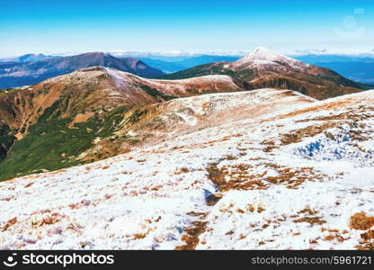 White mountain peaks in snow. Winter landscape