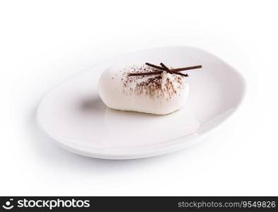 White mousse cake on white plate
