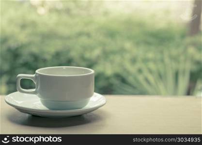 white mug on wooden table