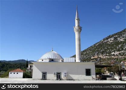White new mosque in old turkish village, Turkey