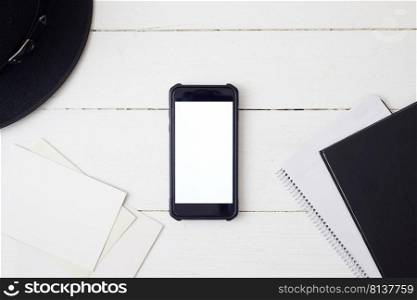 White office desk table with smartphone.Top view . White office desk table with smartphone.  