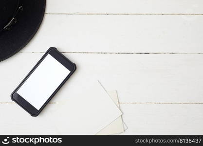 White office desk table with smartphone.Top view . White office desk table with smartphone.  