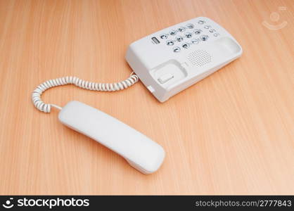 White office phone on the flat surface