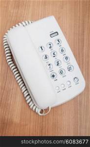 White office phone on the flat surface