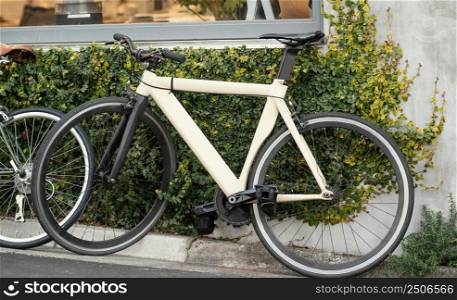 white old bicycle with black wheels
