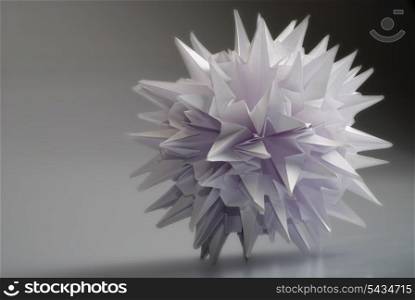 White origami unit kusudama virus or snowflake