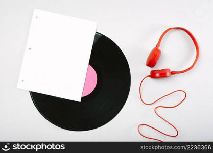 white page vinyl record red headphone white background