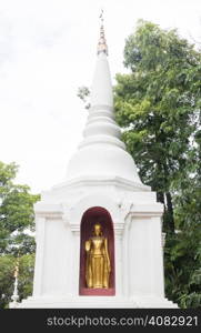 White pagoda and buddha statue in phra singha temple is a public place