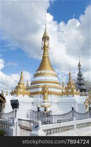White Pagoda architectural design of Thailand. During the daytime sky
